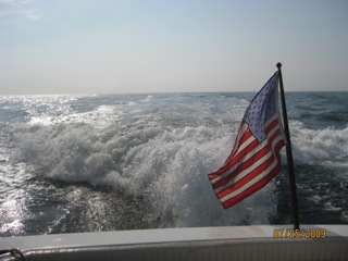 Ambrose Channel from stern of Flotilla 4-2 facility with American flag