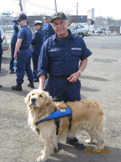 Flotilla member with Station New York mascot, Harry